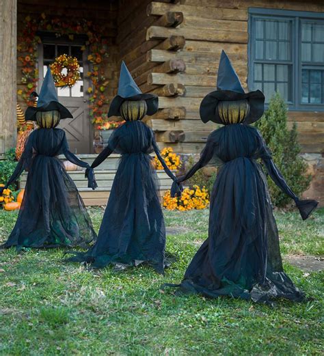 Summon Spookiness with a Witch Figurine Holding Stakes for Halloween